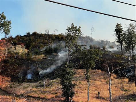 Crews work to extinguish brush fire burning in Napa County